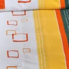Bettwäsche mit Quadratmusterung und Streifen in Orange- und Grautönen