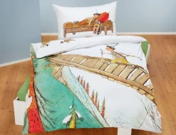 Bettwäsche mit Schellen-Ursli auf der Holzbrücke